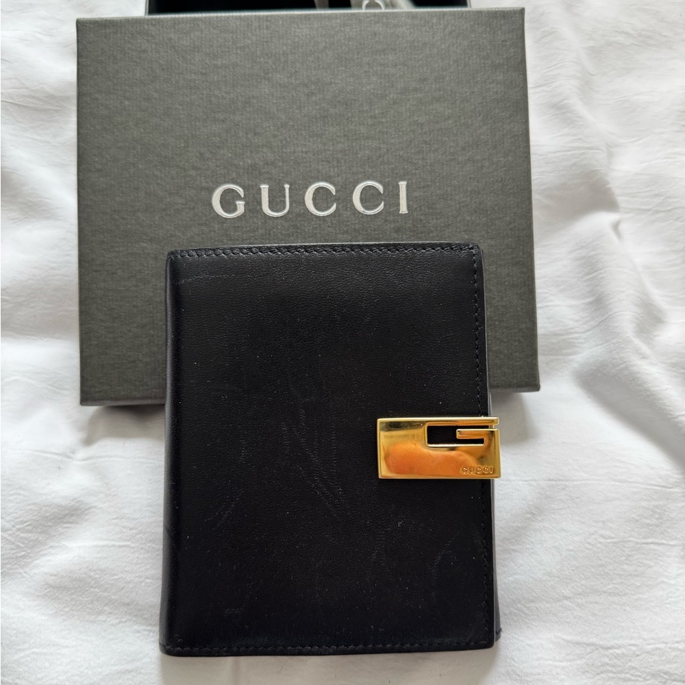 Authentic vintage Gucci Tom Ford era bifold Black Wallet with Gold Buckle
